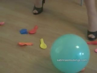 Upskirt shots as this looner blows up balloons