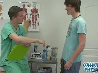 College Guy Visits Campus Doctor For An Exam.
